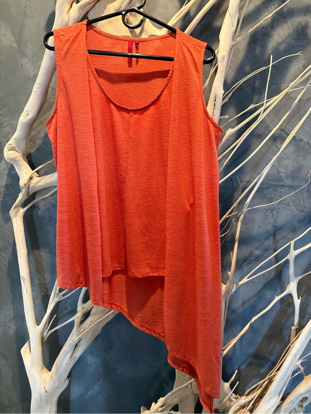 Love Scarlett Sleeveless Asymmetric Tank Top in Vibrant Orange